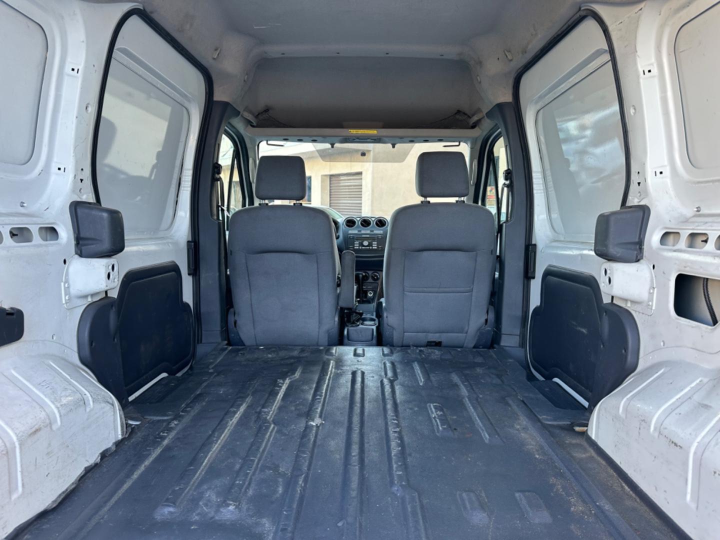 2012 White /Black Ford Transit Connect XLT with Rear Door Glass (NM0LS7BN0CT) with an 2.0L L4 DOHC 16V engine, 4-Speed Automatic transmission, located at 30 S. Berkeley Avenue, Pasadena, CA, 91107, (626) 248-7567, 34.145447, -118.109398 - Great price point for a work van. - Photo#10